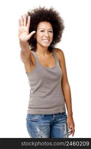 Happy Afro-American young woman isolated on white showing the palm of the hand