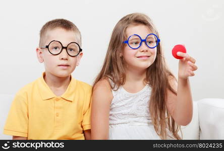 Happy and funny young siblings.. Happy and funny young siblings. Children preparing for carnaval.