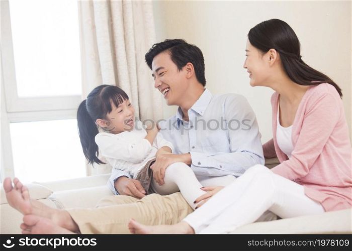 Happy and loving family of three