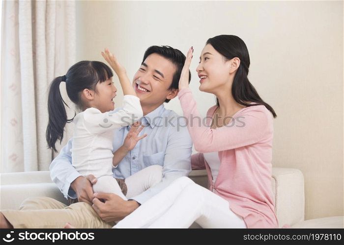 Happy and loving family of three