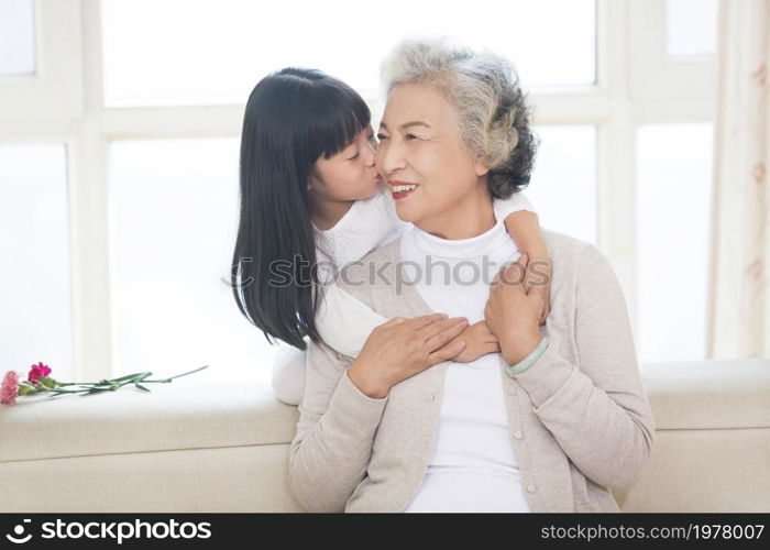 Happy and loving grandma and granddaughter