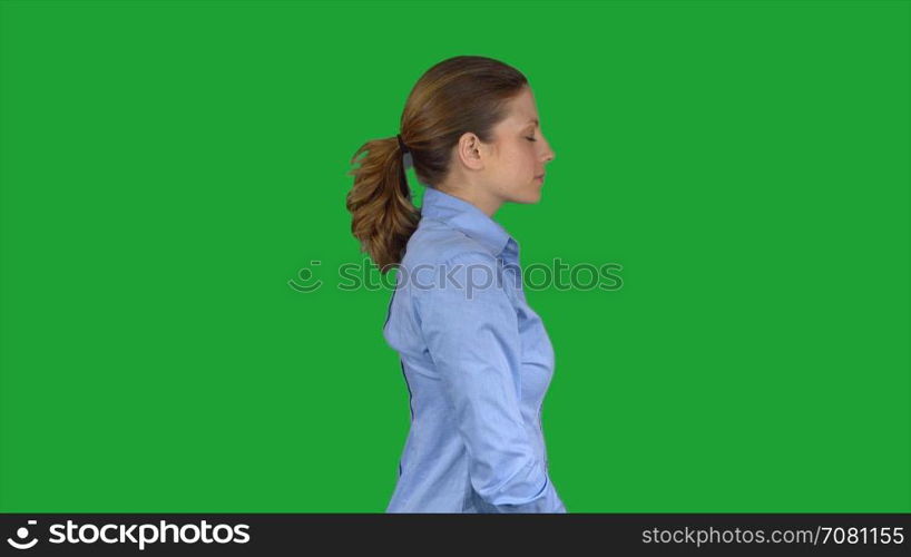 Happy arms crossed working female professional (Green Key)