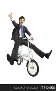 Happy asian businessman on a bicycle isolated on white background