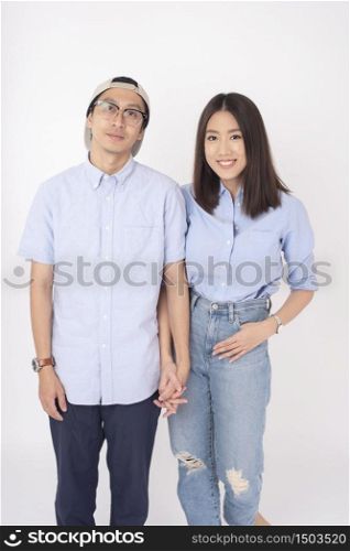 Happy Asian couple in love on white background