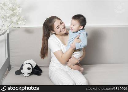 Happy Asian family are enjoy with son at home