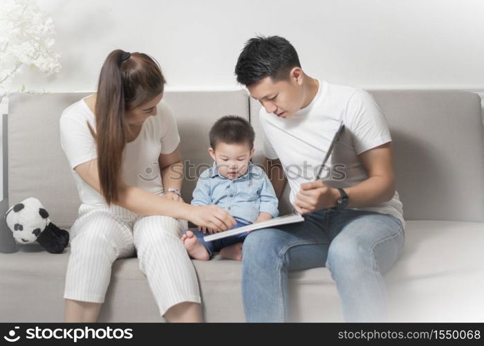 Happy Asian family are enjoy with son at home