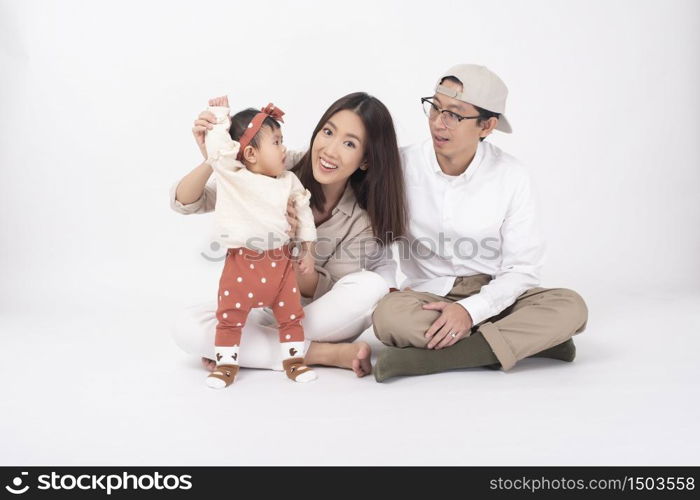 Happy Asian family on white background