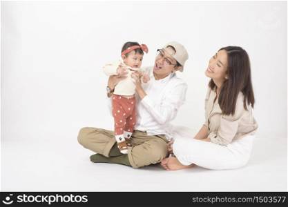 Happy Asian family on white background
