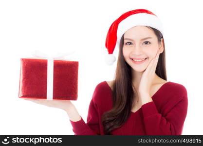 Happy asian woman with smile holding gift box of xmas, Present girl with celebration christmas a holiday, girl with buyer isolated on white background, shopping with season concept.