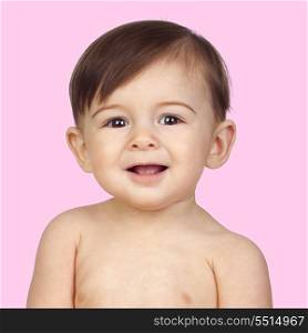 Happy Baby With a Beautiful Smile Isolated on Pink Background