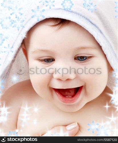 happy baby with terry hoodie robe on head