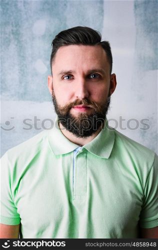 Happy bearded man. Portrait of young adult bearded happy man looking at camera
