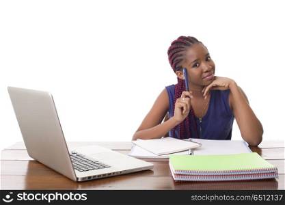 happy beautiful business woman working with a laptop on a desk, isolated on white background. working