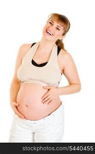 Happy beautiful pregnant woman touching her tummy isolated on white background&#xA;