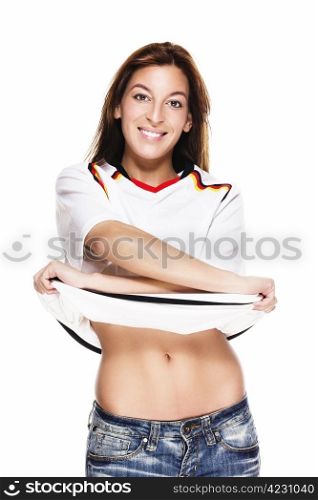 happy beautiful woman about to take her football shirt off. happy beautiful woman about to take her football shirt off on white background