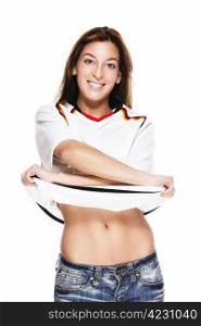 happy beautiful woman about to take her football shirt off. happy beautiful woman about to take her football shirt off on white background
