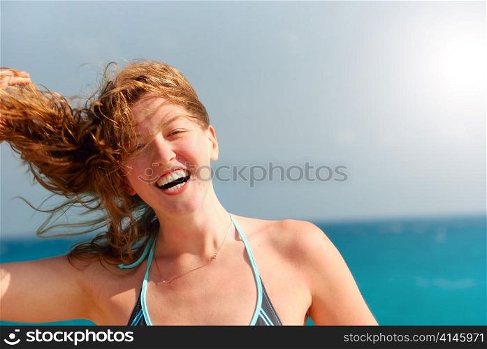 happy beautiful woman on sea