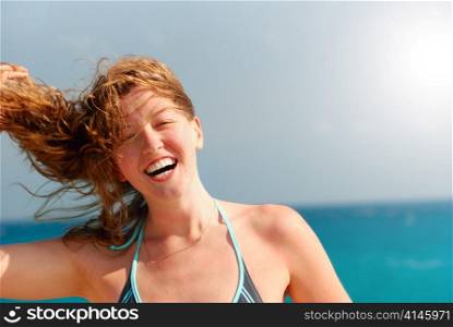 happy beautiful woman on sea