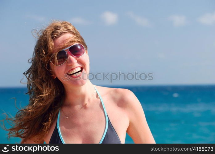 happy beautiful woman on sea