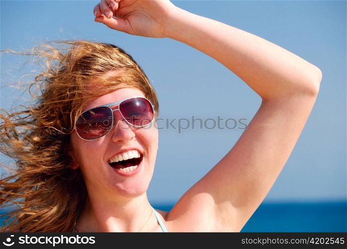 happy beautiful woman on the sea