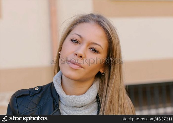 Happy beautiful young woman laughing and smiling on street