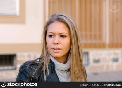 Happy beautiful young woman laughing and smiling on street