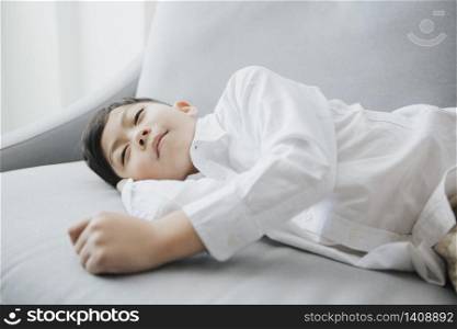 happy bedtime Child sleeping on sofa