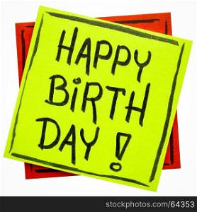 happy birthday greetings - handwriting in black ink on an isolated sticky note