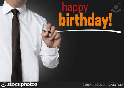 Happy Birthday is written by businessman background concept.. Happy Birthday is written by businessman background concept