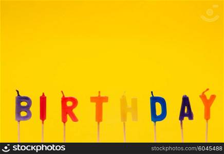 Happy birthday isolated on the yellow background