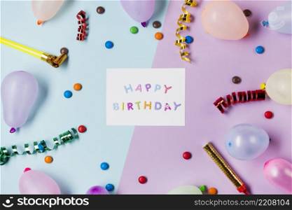 happy birthday message blue pink surrounded with streamers gems balloons colored backdrop