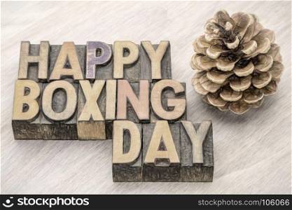 Happy Boxing Day word abstract in vintage letterpress wood type with a digital painitng filter applied