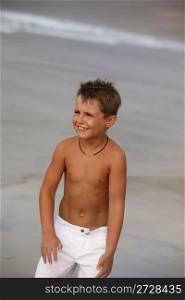 Happy boy on the beach