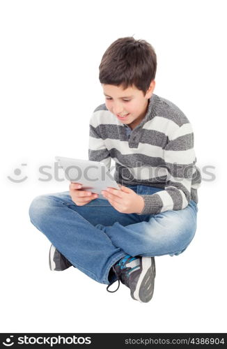 Happy boy with a tablet isolated on a white background