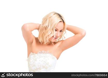 happy bride in a wedding dress posing on a white background