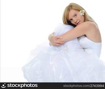 Happy bride lying on the floor. Isolated on white background