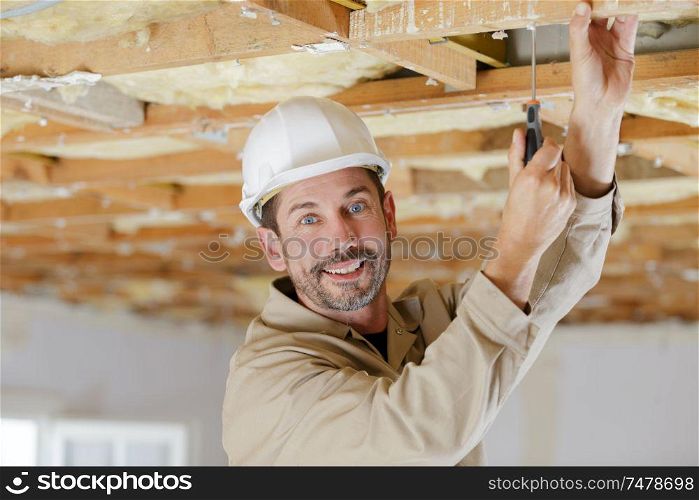happy builder looking at the camera