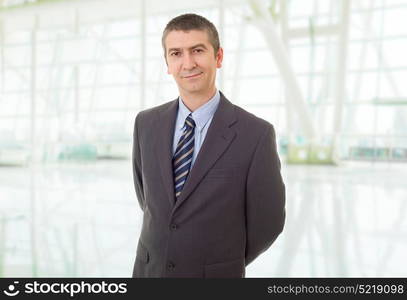 happy business man portrait at the office