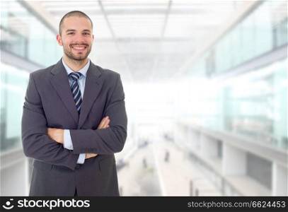 happy business man portrait isolated on office