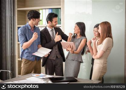 Happy business people applauding in meeting office, successful teamwork concept