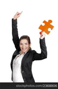 Happy business woman holding a big piece of puzzle, isolated on white