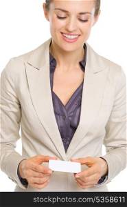 Happy business woman holding business card