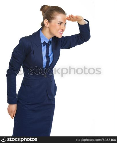 Happy business woman looking into distance