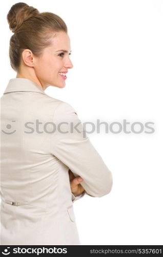 Happy business woman looking on copy space