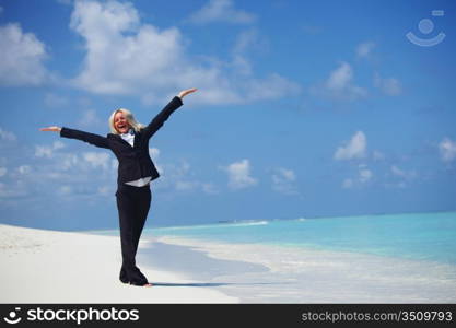 happy business woman on the desolate ocean coast