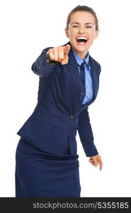 Happy business woman pointing in camera