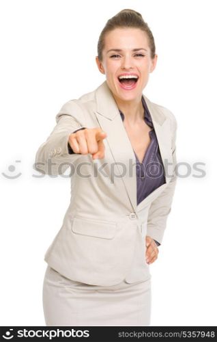Happy business woman pointing in camera
