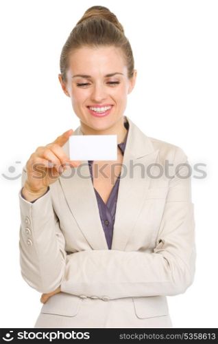 Happy business woman reading business card