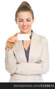 Happy business woman reading business card