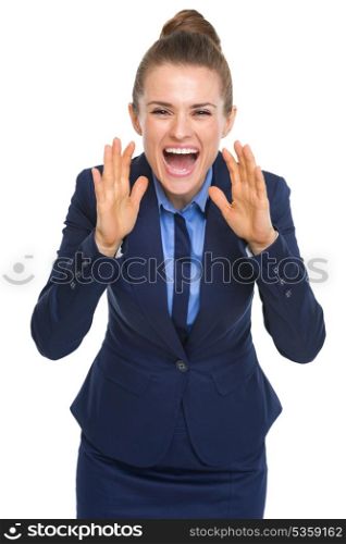 Happy business woman shouting through megaphone shaped hands